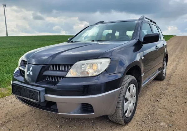 kujawsko-pomorskie Mitsubishi Outlander cena 14900 przebieg: 214100, rok produkcji 2005 z Chełmno